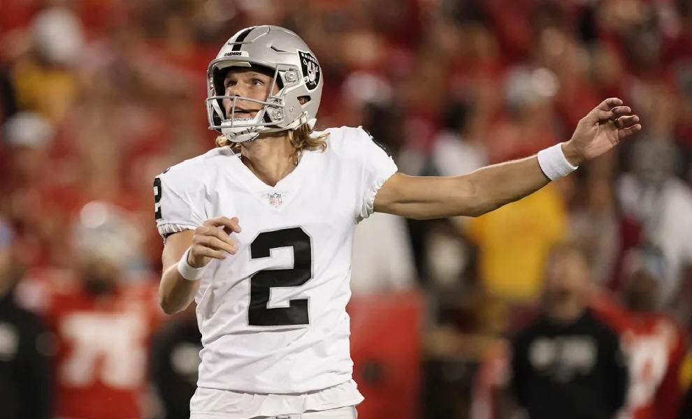 Las Vegas Raiders place kicker Daniel Carlson watches his 47-yard field goal during the second half of an NFL football game against the Kansas City Chiefs Monday, Oct. 10, 2022, in Kansas City, Mo. (AP Photo/Charlie Riedel)